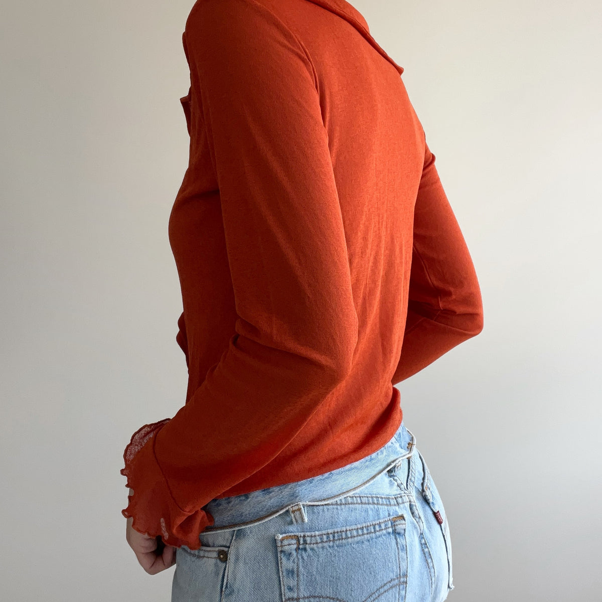 RUFFLE LONG SLEEVE