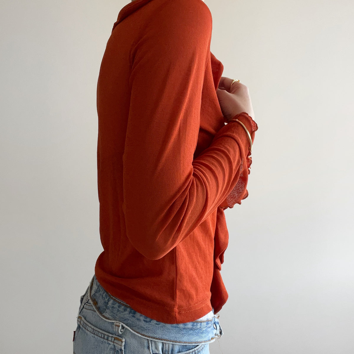 RUFFLE LONG SLEEVE