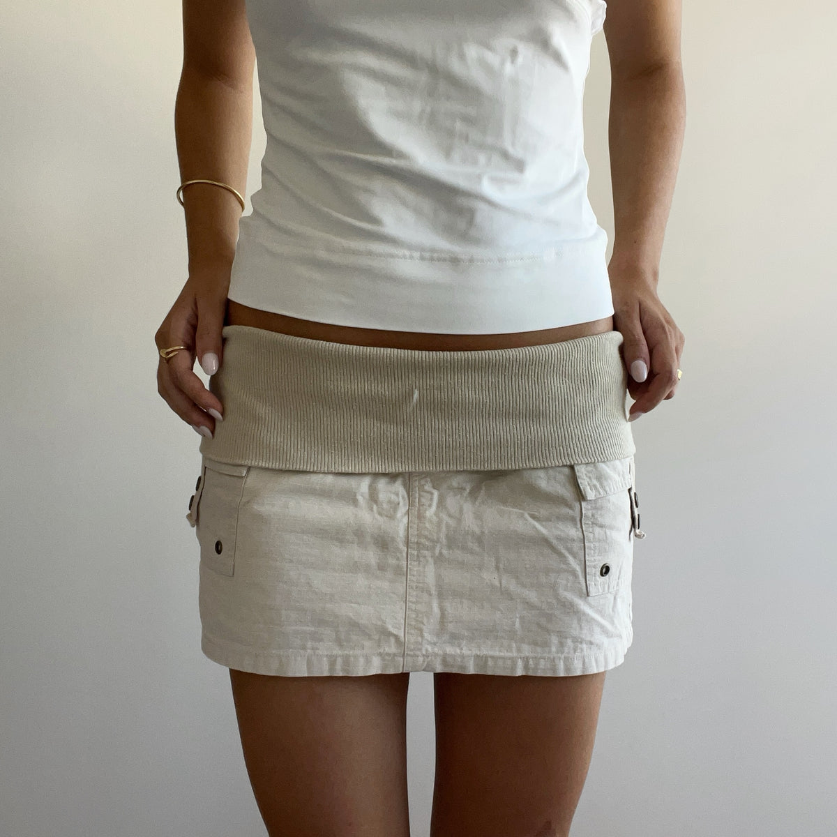 CREAM FOLDOVER MINI SKIRT